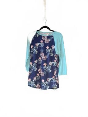 LuLaRoe Raglan Sleeve Shirt with Blue and Pineapple Print